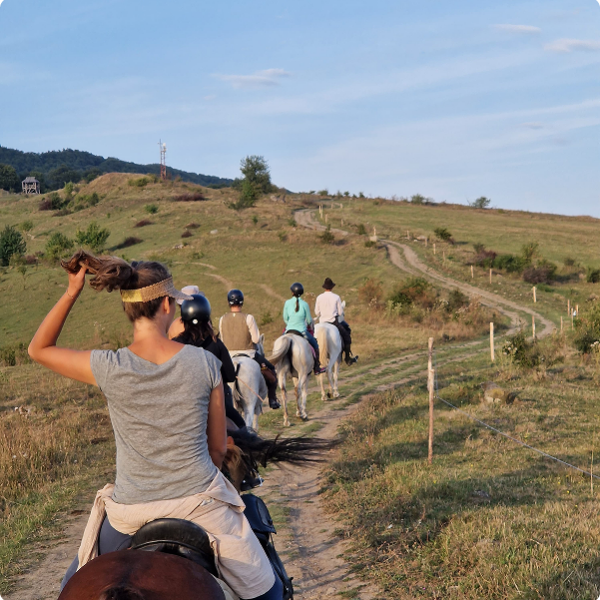 A group of people riding on a trail